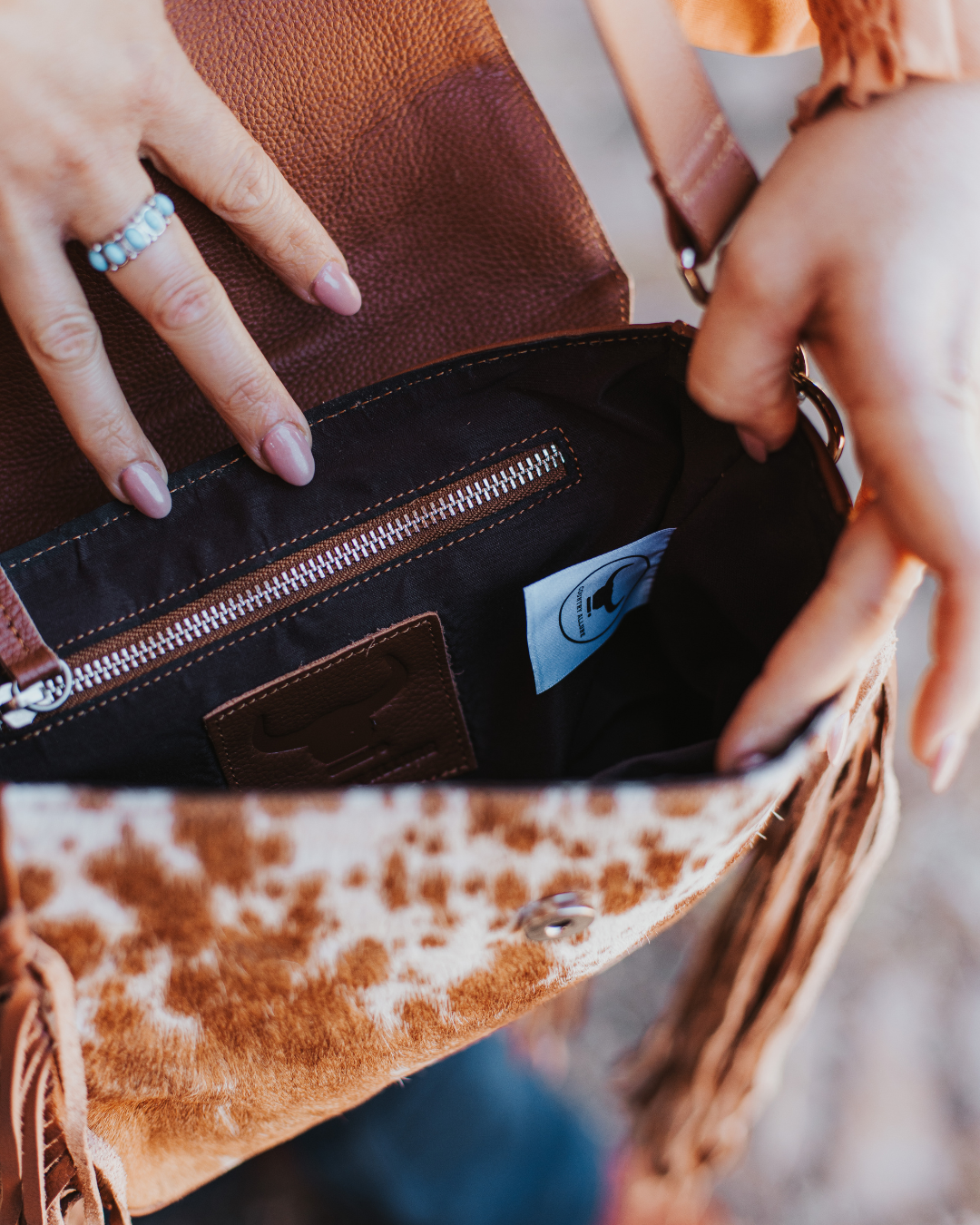 Aria Tassel Cowhide Handbag